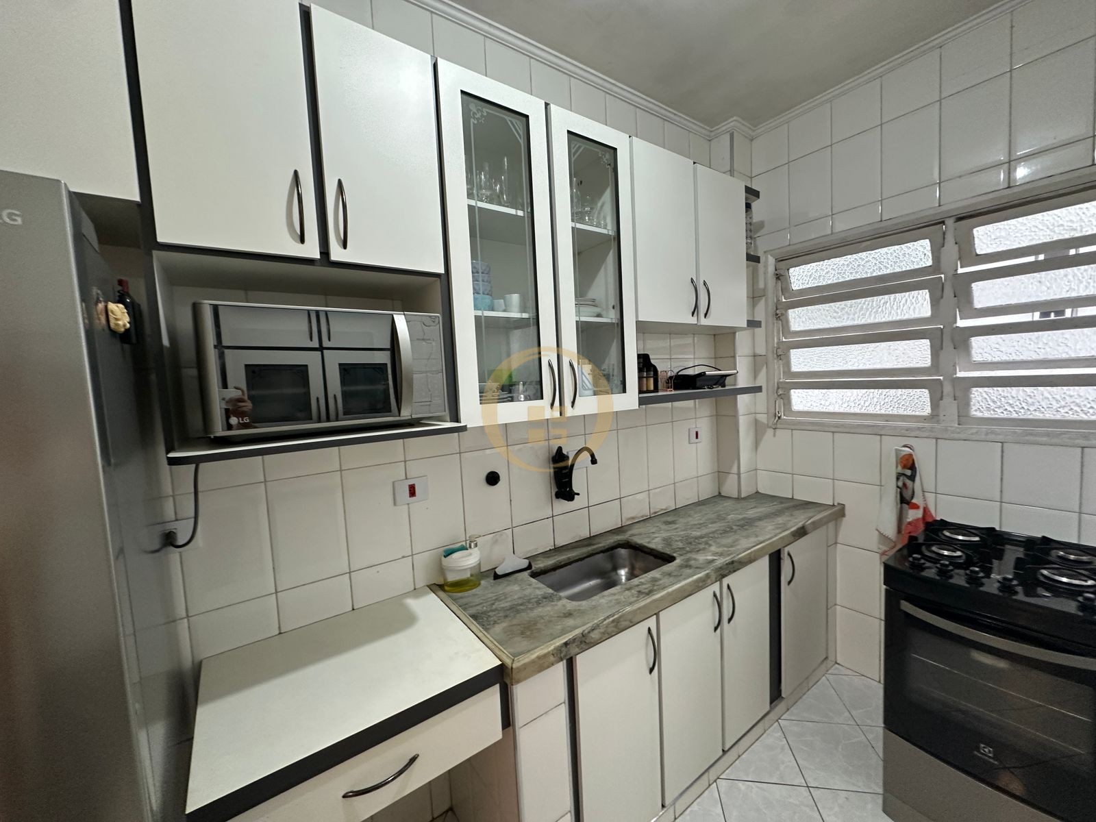 Apartamento na Praia das Pitangueiras, Guarujá - SP