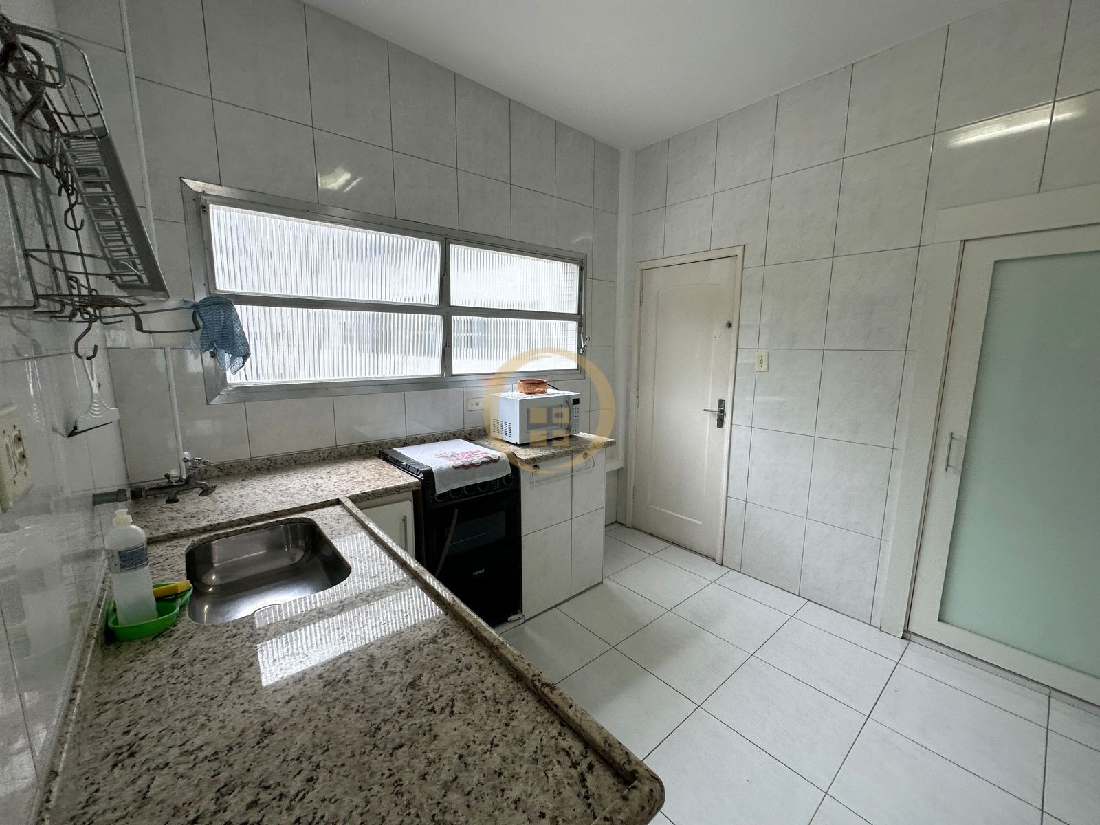 Apartamento na Praia das Pitangueiras, Guarujá - SP